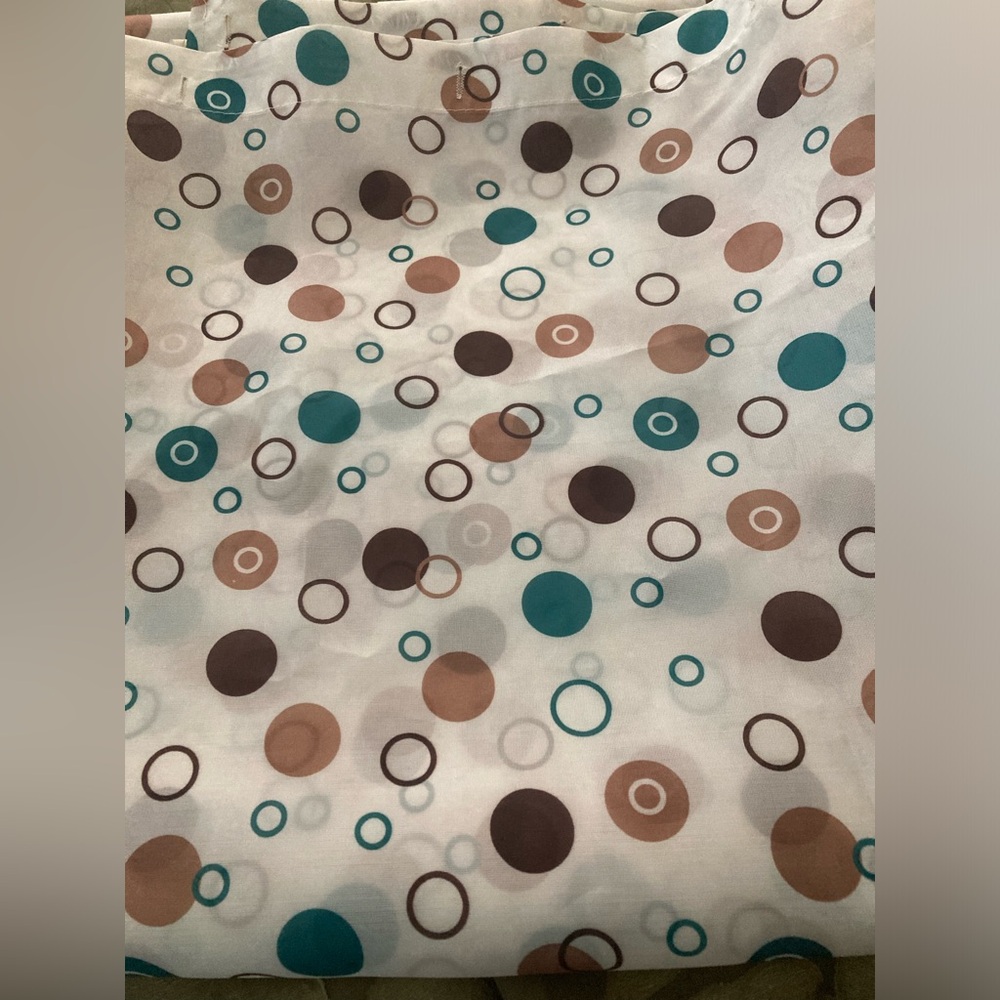 Shower curtain in polka dot print
